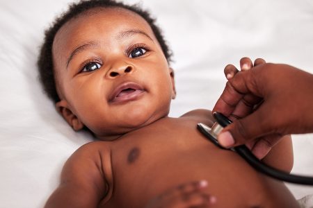 Shot of a little baby at a checkup with a doctor at a clinic.