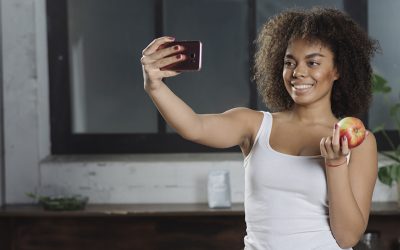 woman-taking-selfie-kitchen woman-taking-selfie-kitchen
